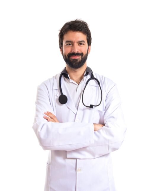 Doctor with his arms crossed over white background